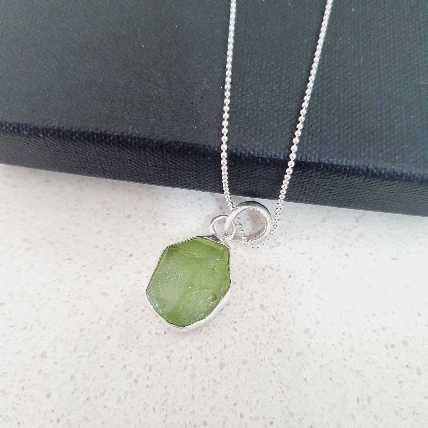 Raw Peridot pendant