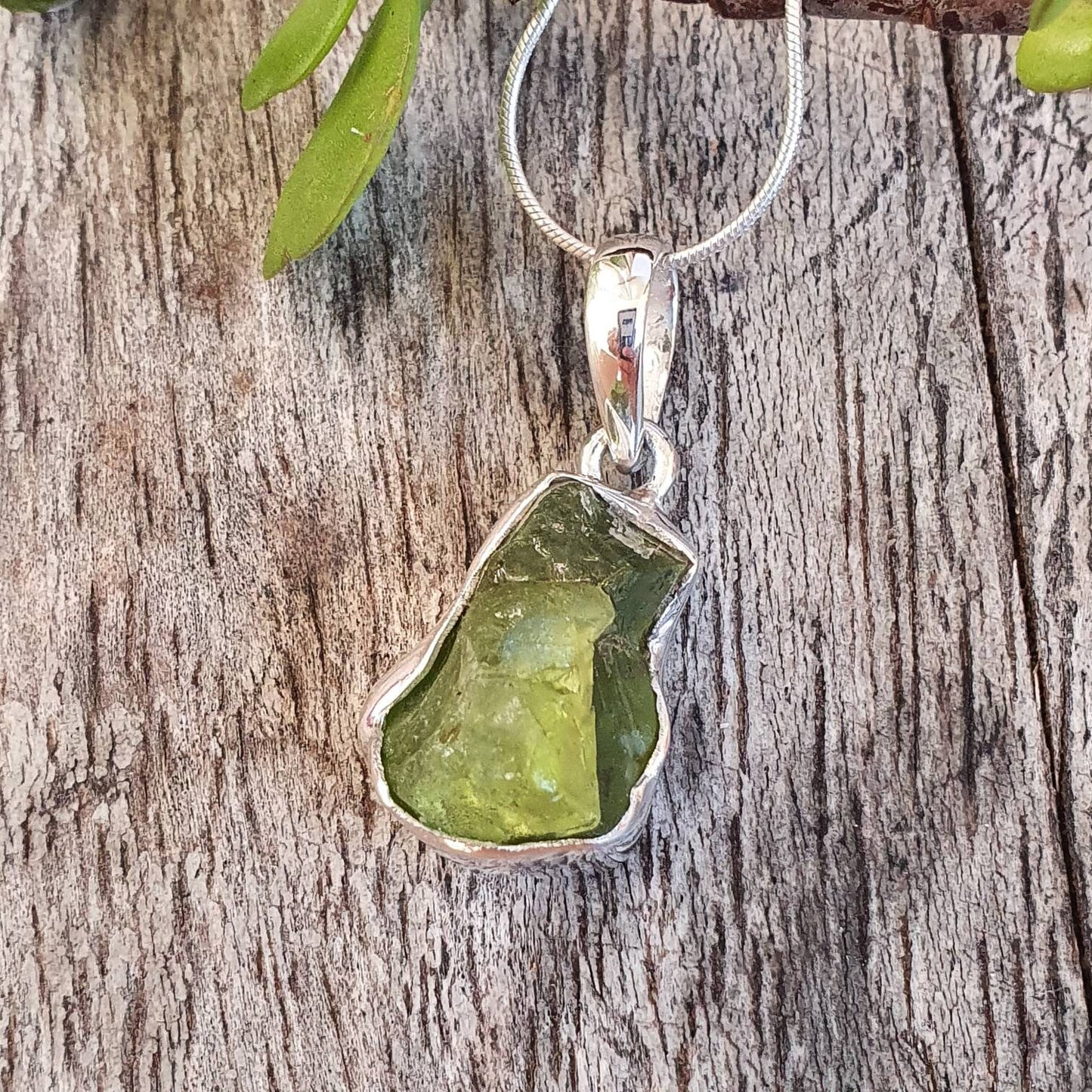 Raw Peridot pendant