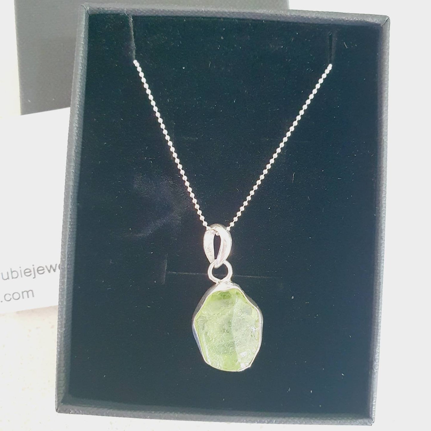 Raw Peridot pendant