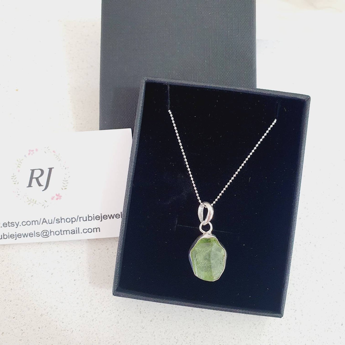 Raw Peridot pendant