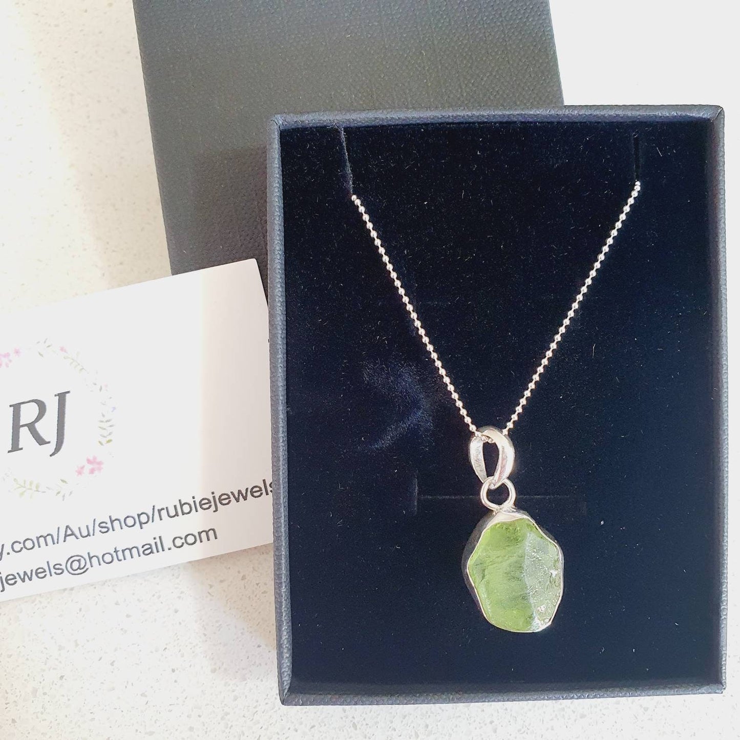 Raw Peridot pendant