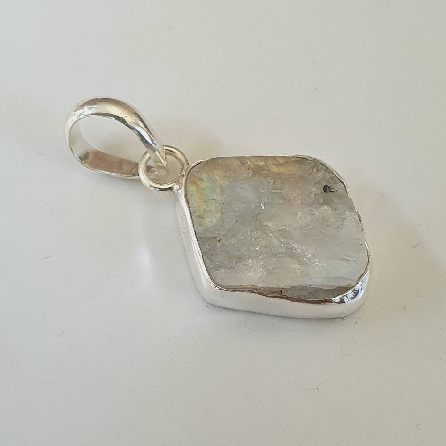 Raw moonstone pendant